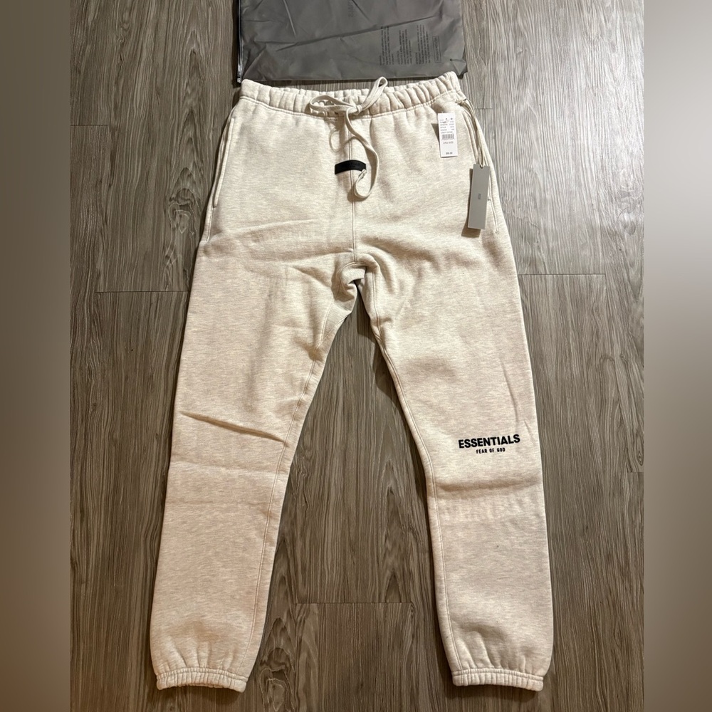 Essentials fear of god sweat pants light oat size medium
